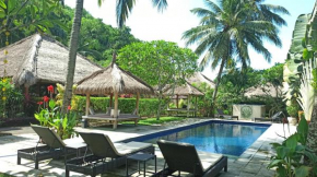 Гостиница Mama Bella's Retreat  Batu Layar